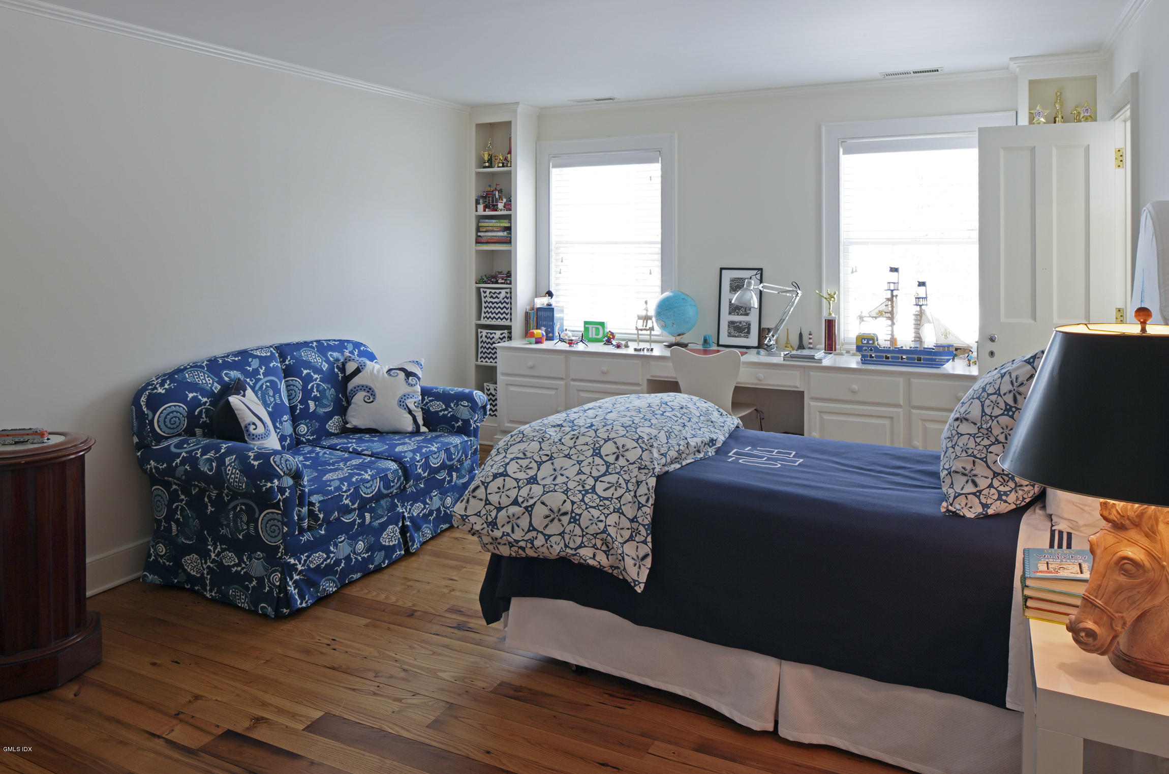 733 Lake Avenue Greenwich, CT 06830 - Photo 17 of 25 a living room with furniture and a window