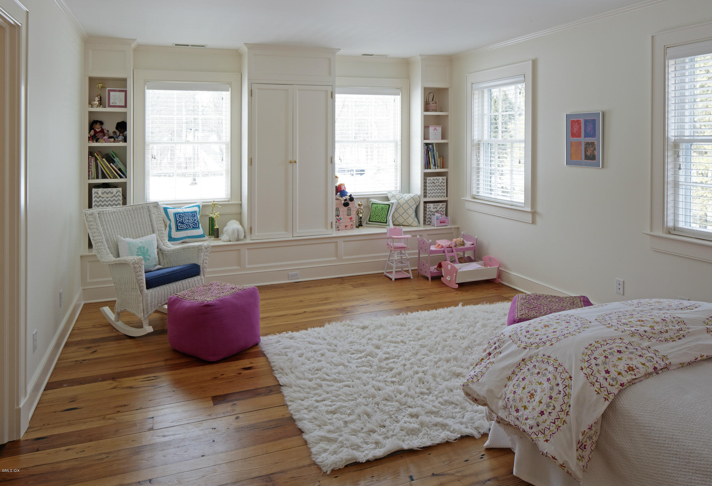 733 Lake Avenue Greenwich, CT 06830 - Photo 18 of 25 a bed room with a bed and a couch