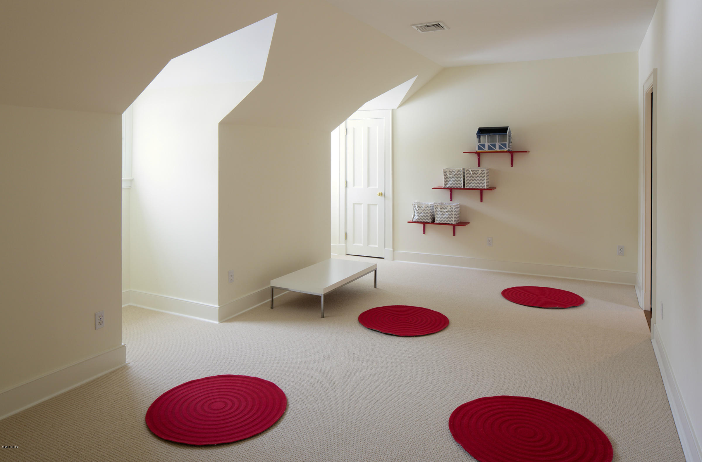 733 Lake Avenue Greenwich, CT 06830 - Photo 20 of 25 a view of a room with wooden floor