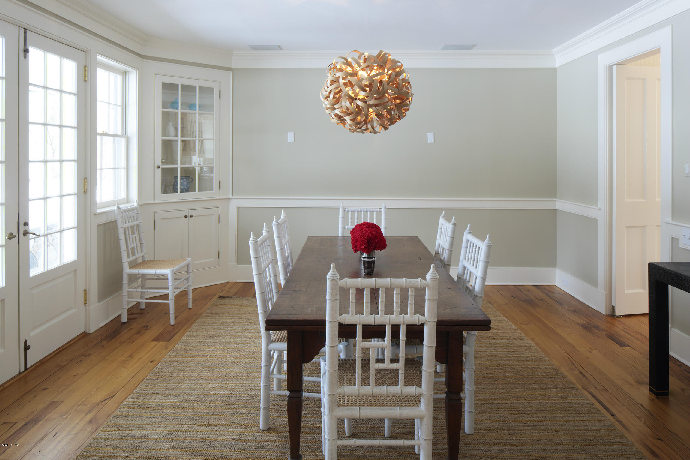 733 Lake Avenue Greenwich, CT 06830 - Photo 8 of 25 a view of a dining room with furniture window and wooden floor