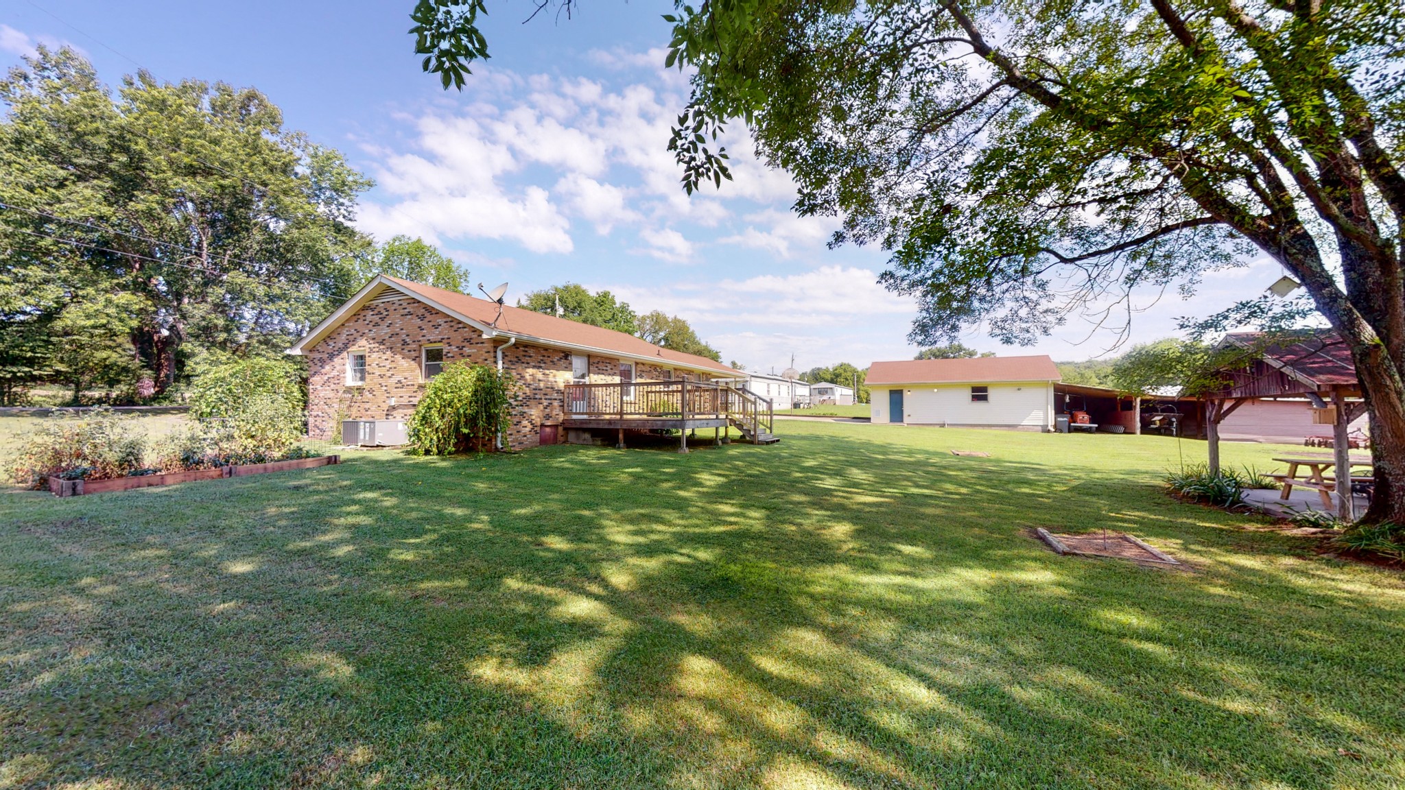280 Lindsley Road Lebanon, TN 37090 - Photo 5 of 41 a front view of house with yard and trees in the background