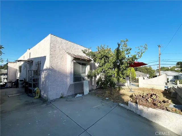 a street view with tall buildings and a street