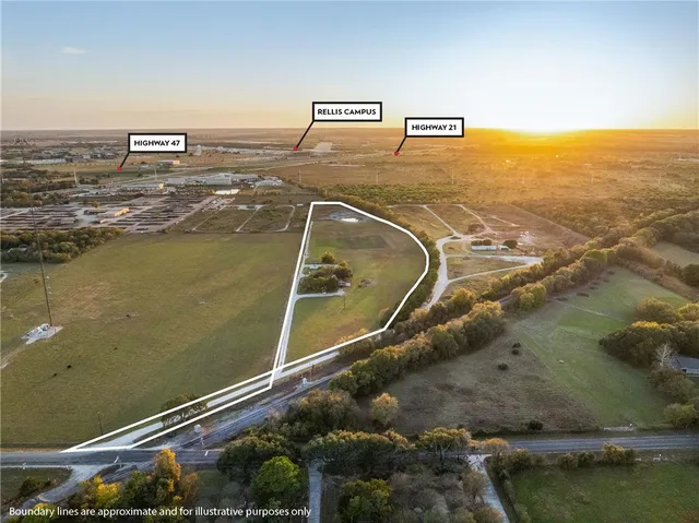 a kitchen with kitchen island a counter top space stainless steel appliances and cabinets