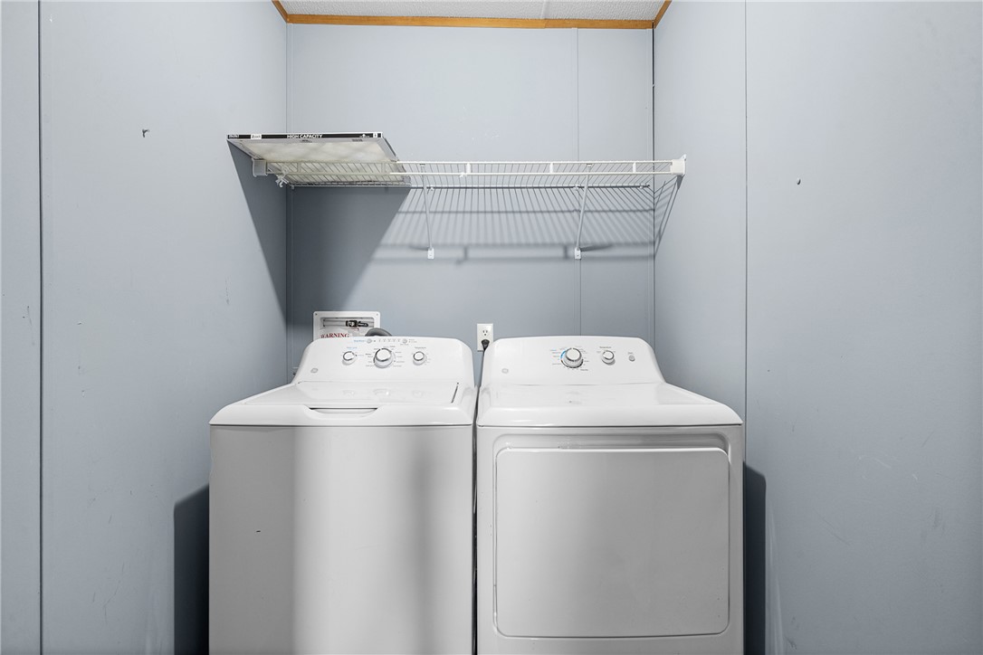 2361 Smetana Road Bryan, TX 77807 - Photo 13 of 32 a utility room with dryer and washer