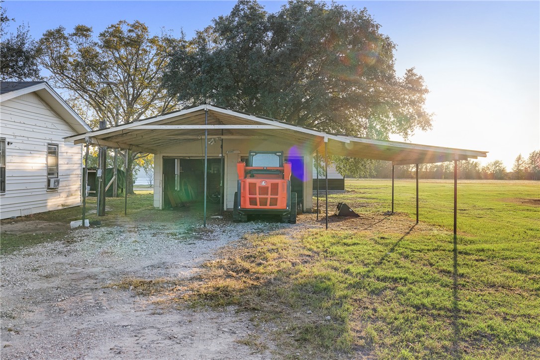 2361 Smetana Road Bryan, TX 77807 - Photo 26 of 32 a backyard of a house with table and chairs