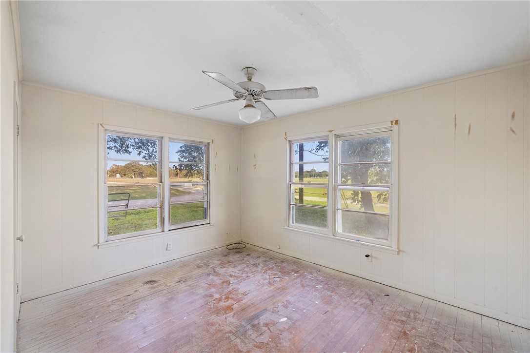2361 Smetana Road Bryan, TX 77807 - Photo 28 of 32 an empty room with windows and closet