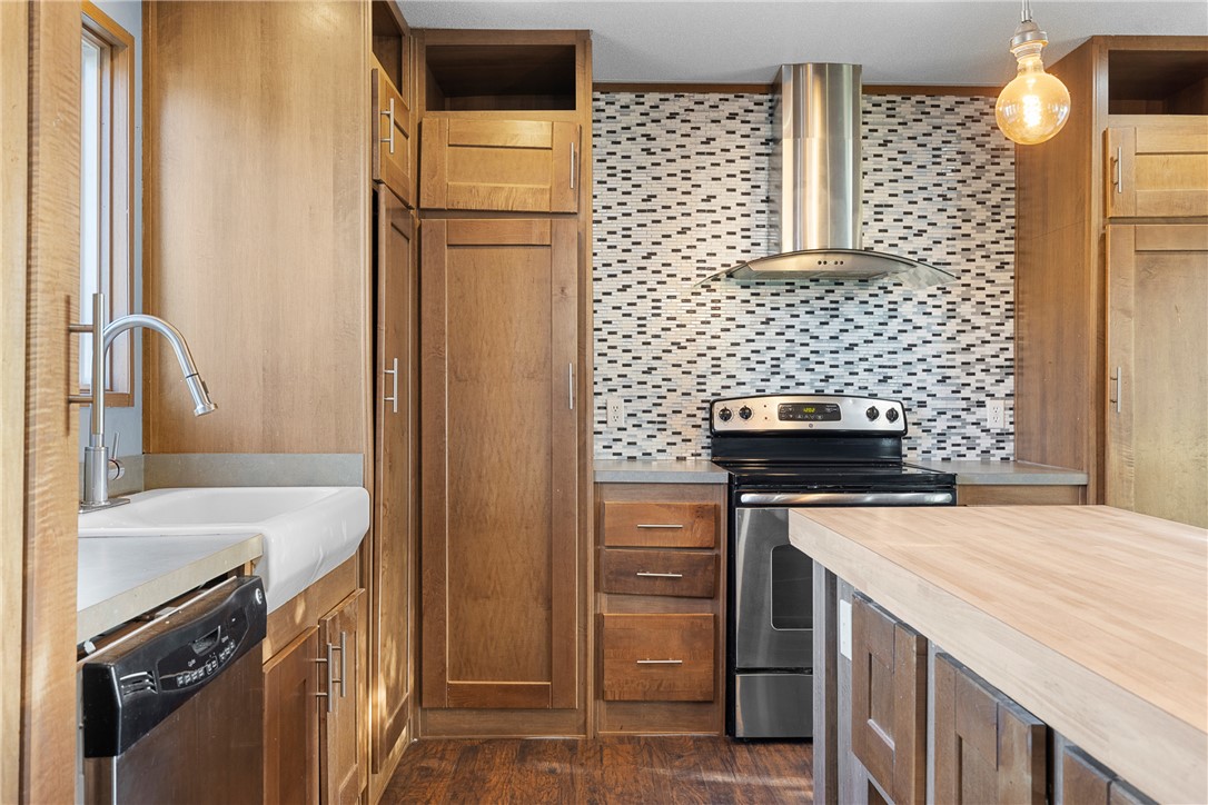 2361 Smetana Road Bryan, TX 77807 - Photo 3 of 32 a kitchen with a stove and a refrigerator