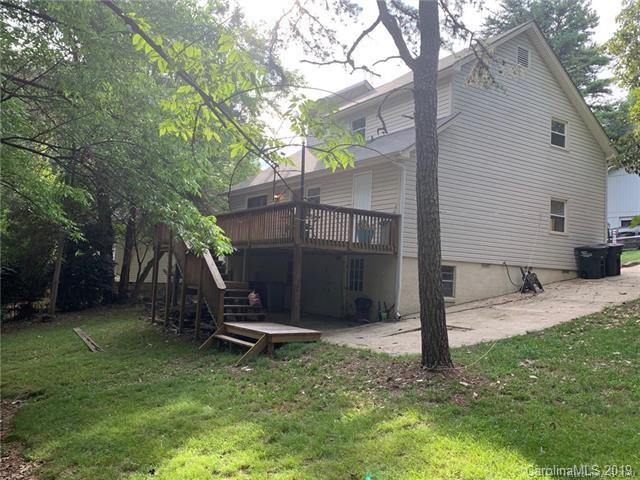 3093 Point Clear Drive Tega Cay, SC 29708 - Photo 2 of 28 a view of a backyard with a tree