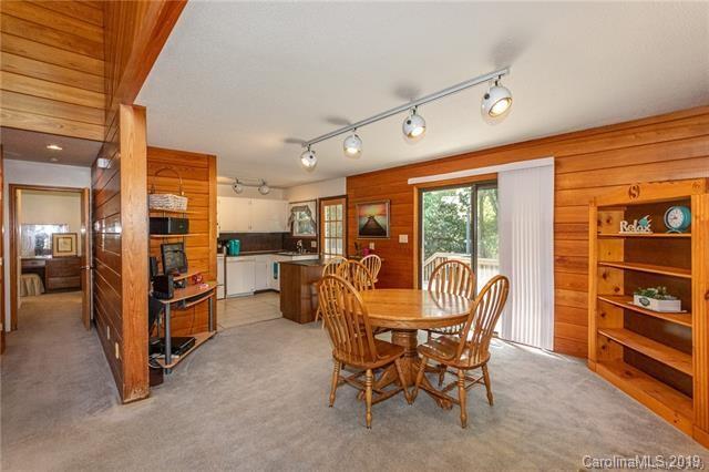 3093 Point Clear Drive Tega Cay, SC 29708 - Photo 12 of 28 a dining room with furniture and a kitchen view