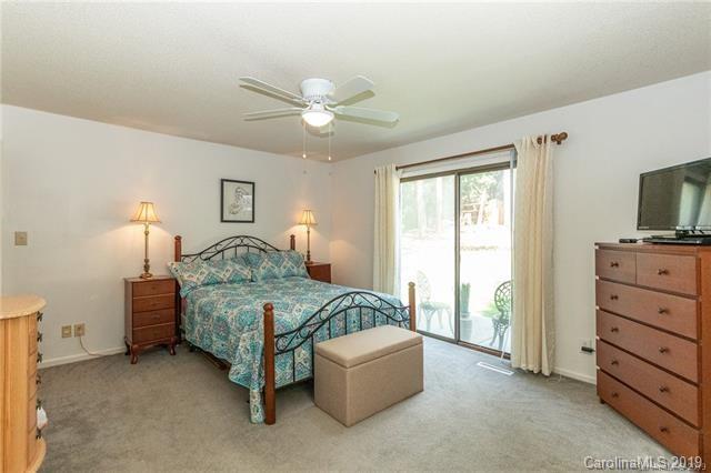 3093 Point Clear Drive Tega Cay, SC 29708 - Photo 19 of 28 a bedroom with a bed and a flat screen tv
