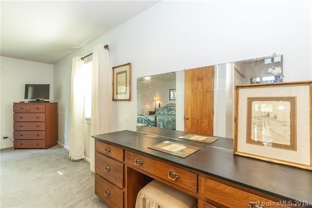 3093 Point Clear Drive Tega Cay, SC 29708 - Photo 21 of 28 a spacious bathroom with a double vanity sink and a mirror