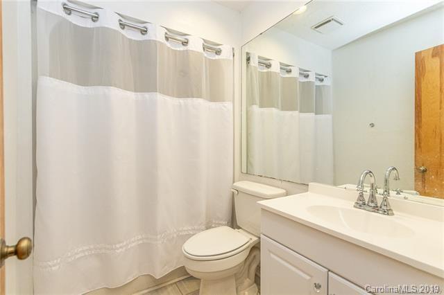 3093 Point Clear Drive Tega Cay, SC 29708 - Photo 22 of 28 a bathroom with a sink toilet and shower