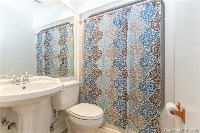 3093 Point Clear Drive Tega Cay, SC 29708 - Photo 25 of 28 a bathroom with a sink toilet and shower