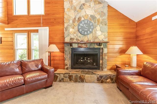 3093 Point Clear Drive Tega Cay, SC 29708 - Photo 7 of 28 a living room with furniture and a fireplace