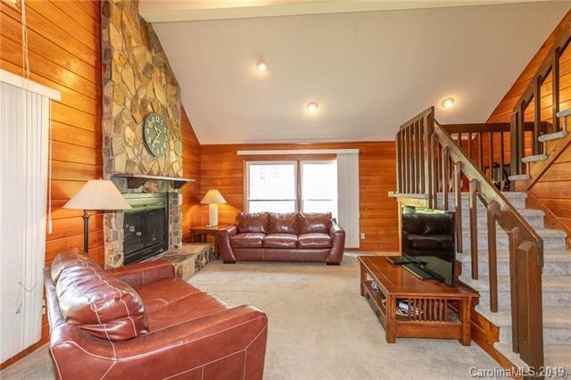 3093 Point Clear Drive Tega Cay, SC 29708 - Photo 10 of 28 a living room with furniture and a fireplace