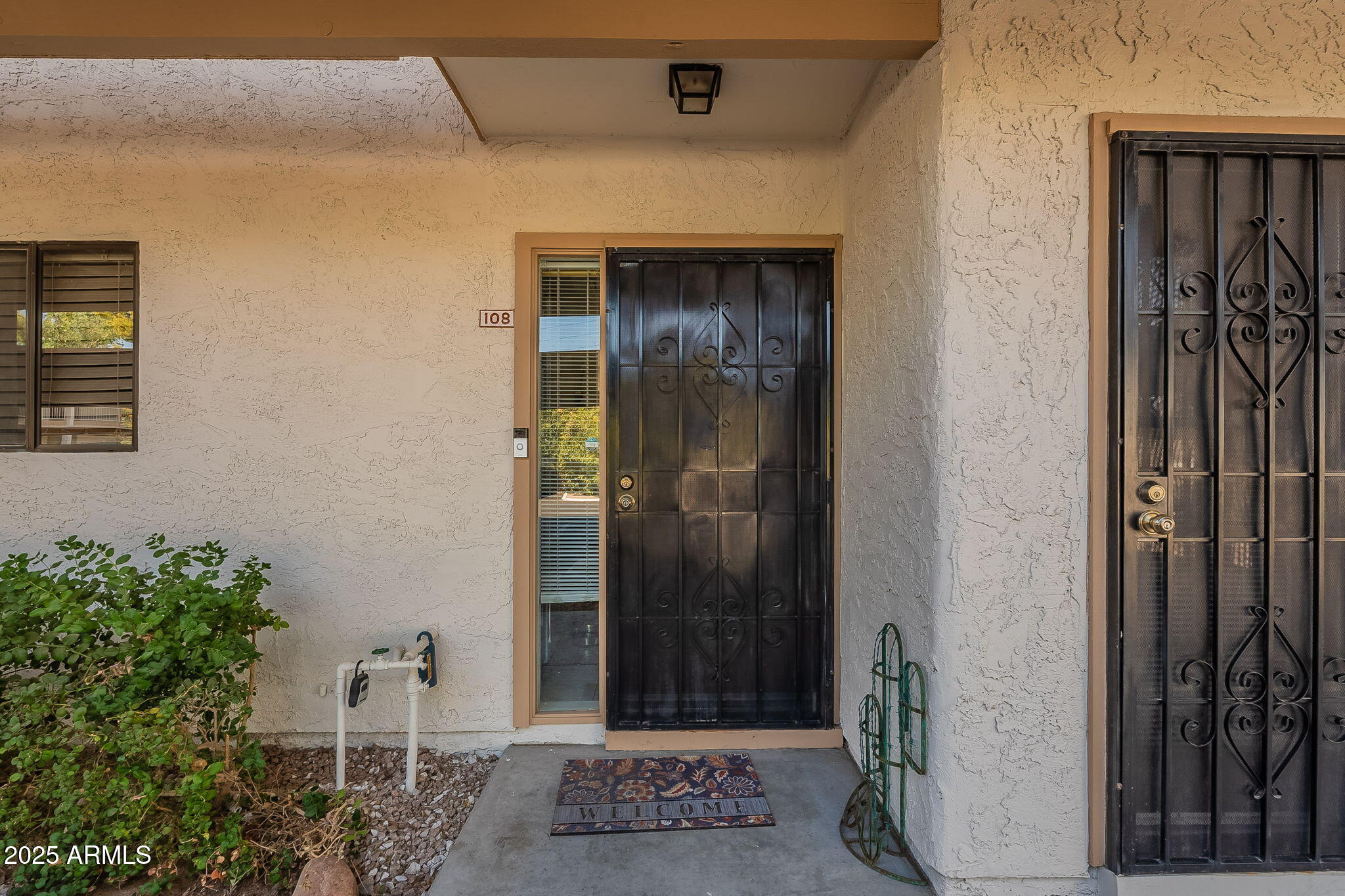 709 South Power Road, Unit 108 Mesa, AZ 85206 - Photo 34 of 36 Front Door & Bedroom 1 entry