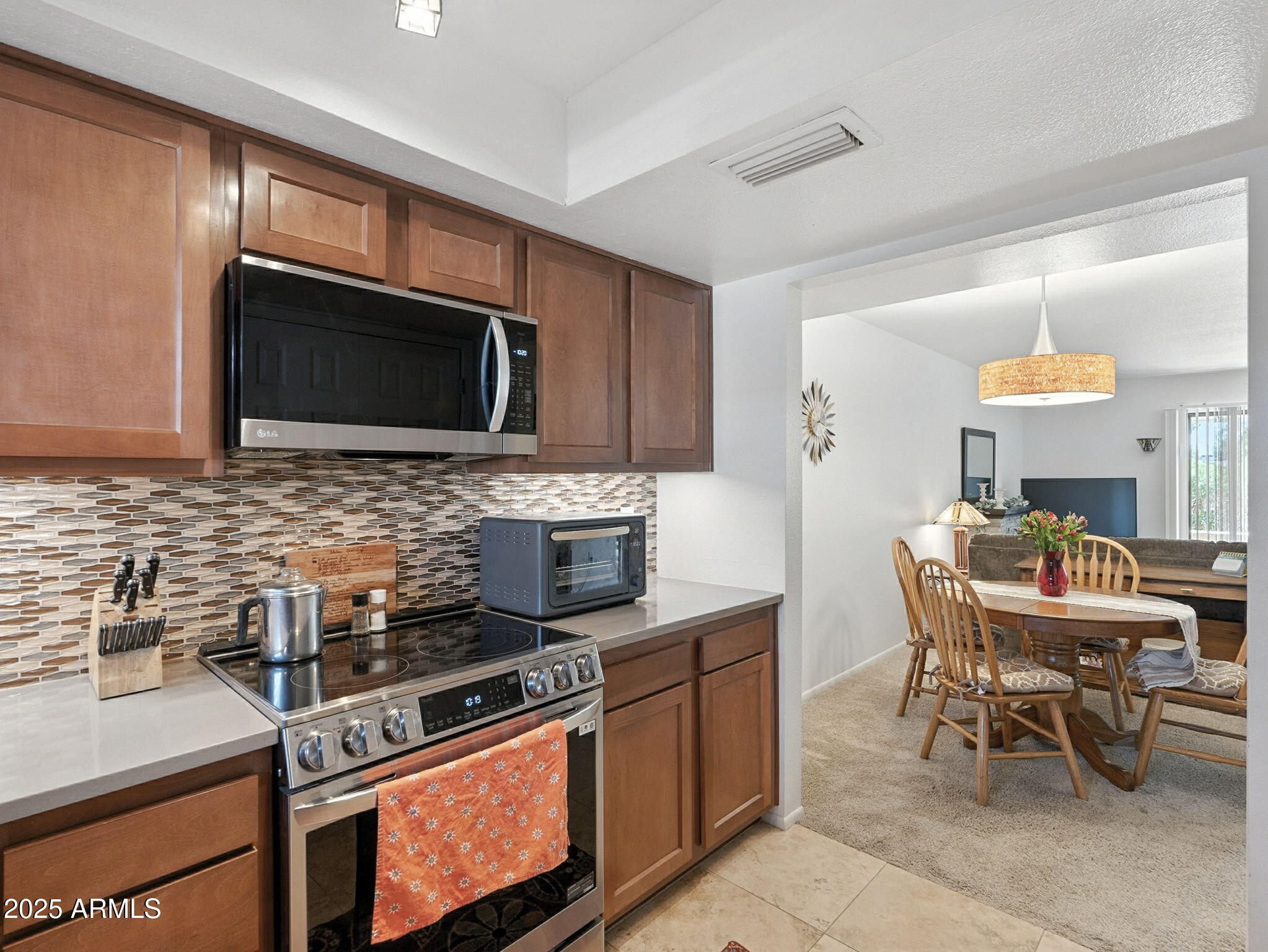 709 South Power Road, Unit 108 Mesa, AZ 85206 - Photo 4 of 36 Kitchen to Dining