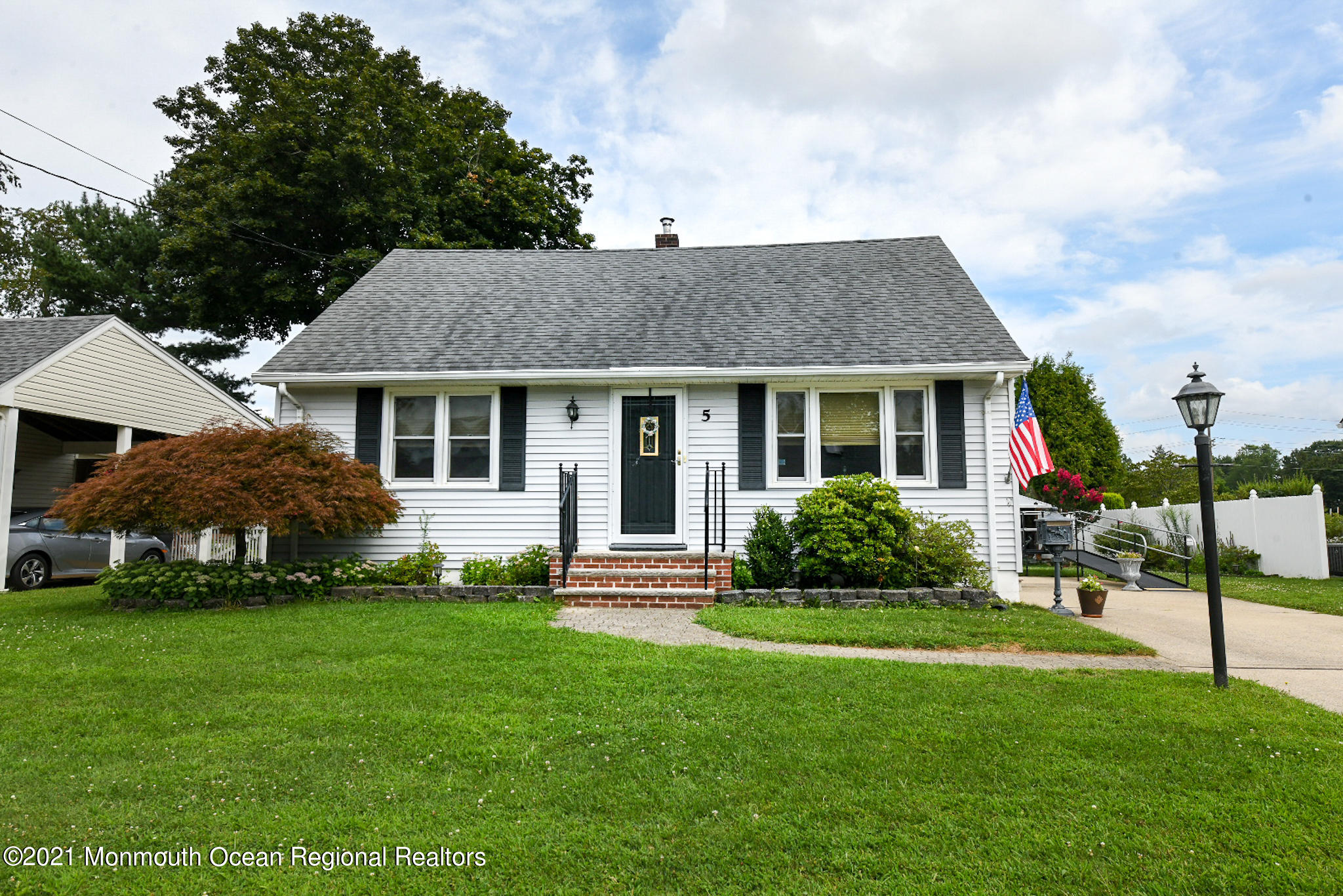 5 Phyllis Road West Orange, NJ 07052 - Photo 2 of 18 a front view of a house with a yard