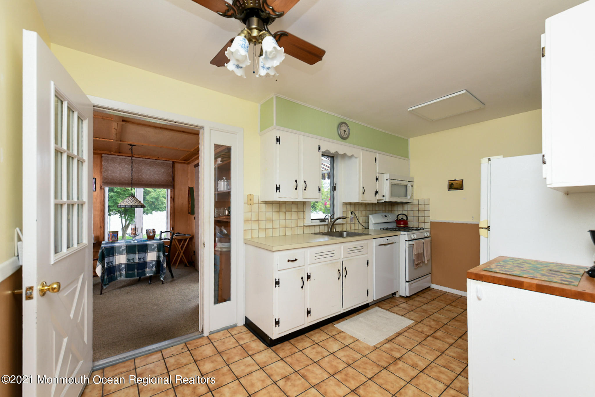 5 Phyllis Road West Orange, NJ 07052 - Photo 9 of 18 a large kitchen with a lot of cabinets and wooden floor
