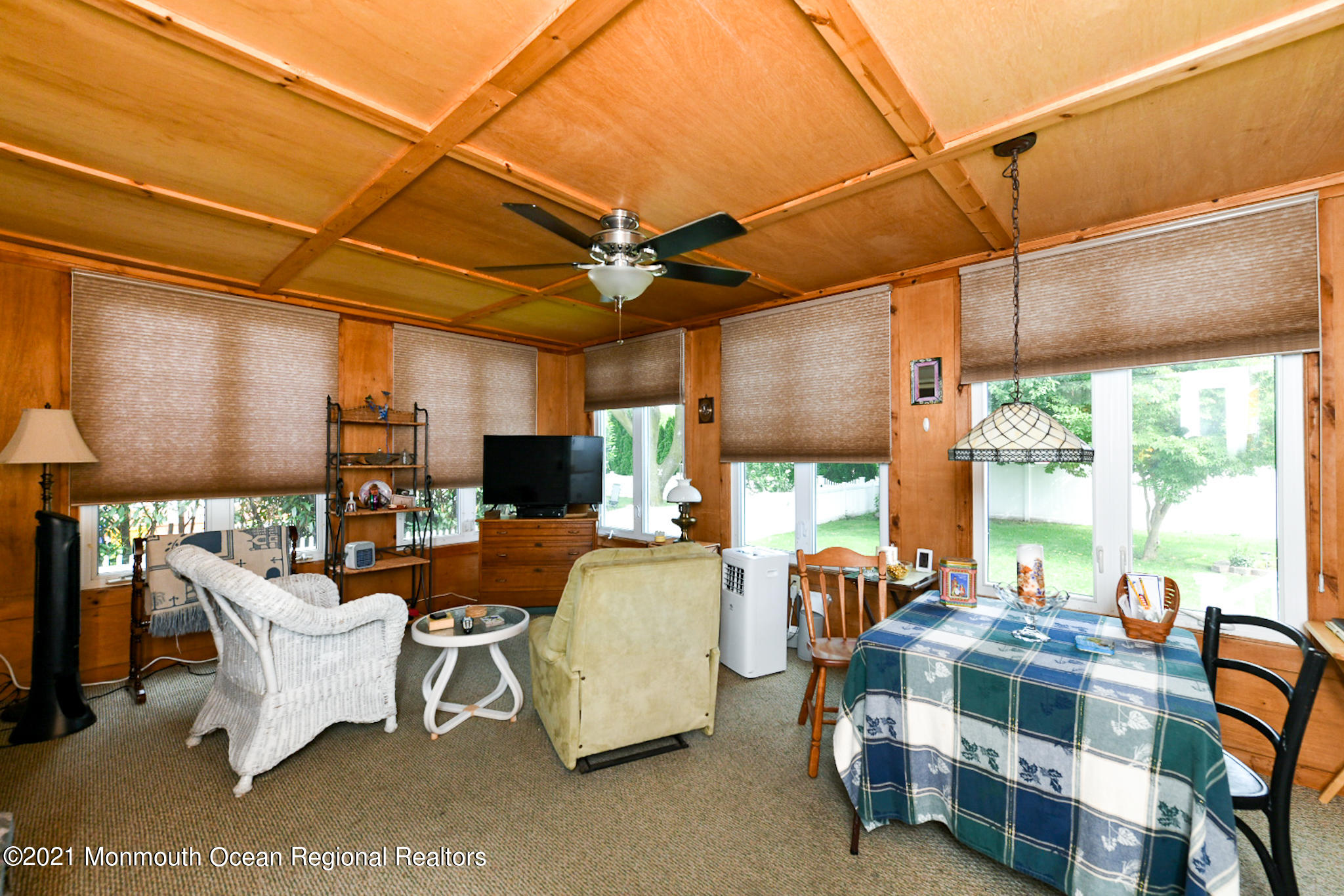 5 Phyllis Road West Orange, NJ 07052 - Photo 10 of 18 a living room with furniture a fireplace and a table