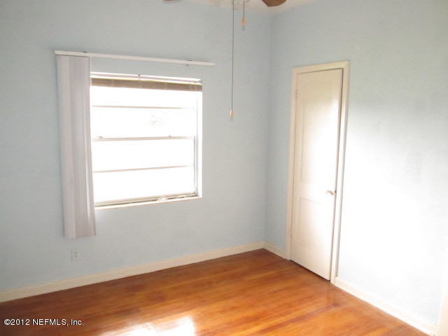 3245 Barkley Road Jacksonville, FL 32246 - Photo 6 of 11 a view of an empty room and window