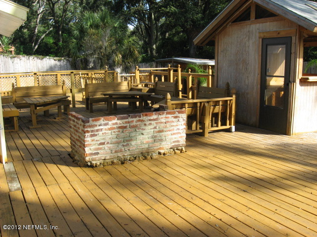 3245 Barkley Road Jacksonville, FL 32246 - Photo 9 of 11 a view of a house with wooden floor