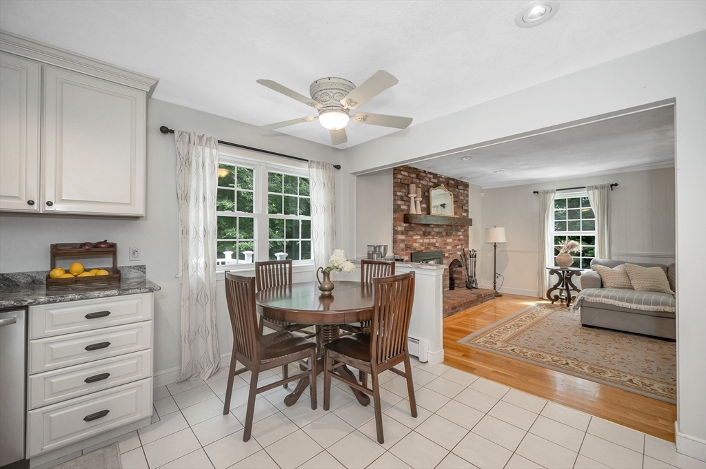 67 Reservation Road Andover, MA 01810 - Photo 14 of 40 a view of a dining room with furniture