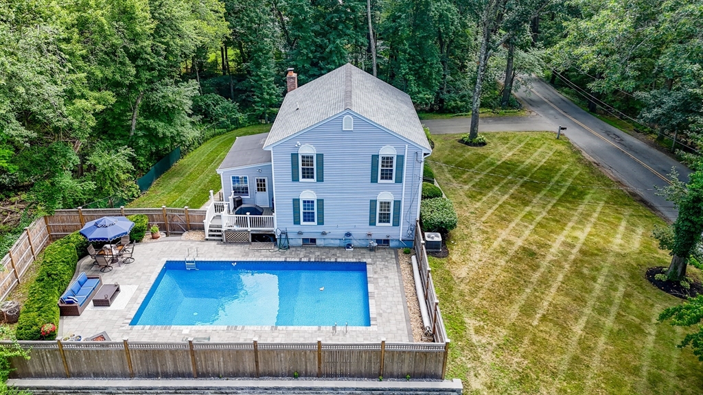 67 Reservation Road Andover, MA 01810 - Photo 3 of 40 a view of house with outdoor space