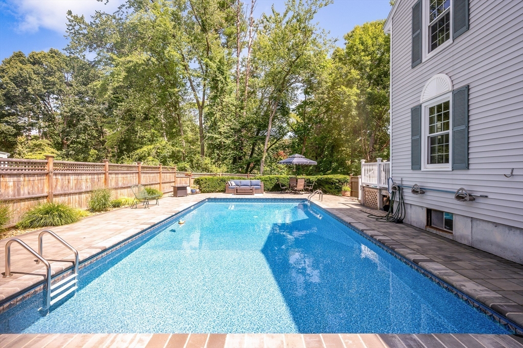 67 Reservation Road Andover, MA 01810 - Photo 36 of 40 swimming pool view with a seating space