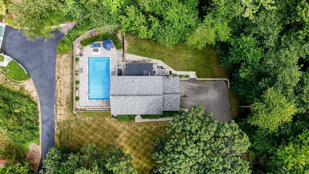 67 Reservation Road Andover, MA 01810 - Photo 37 of 40 an aerial view of a house with a yard