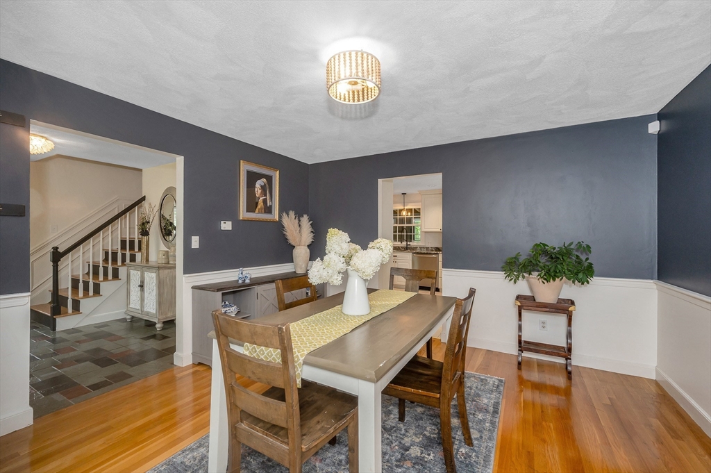 67 Reservation Road Andover, MA 01810 - Photo 9 of 40 a view of a dining room with furniture and wooden floor