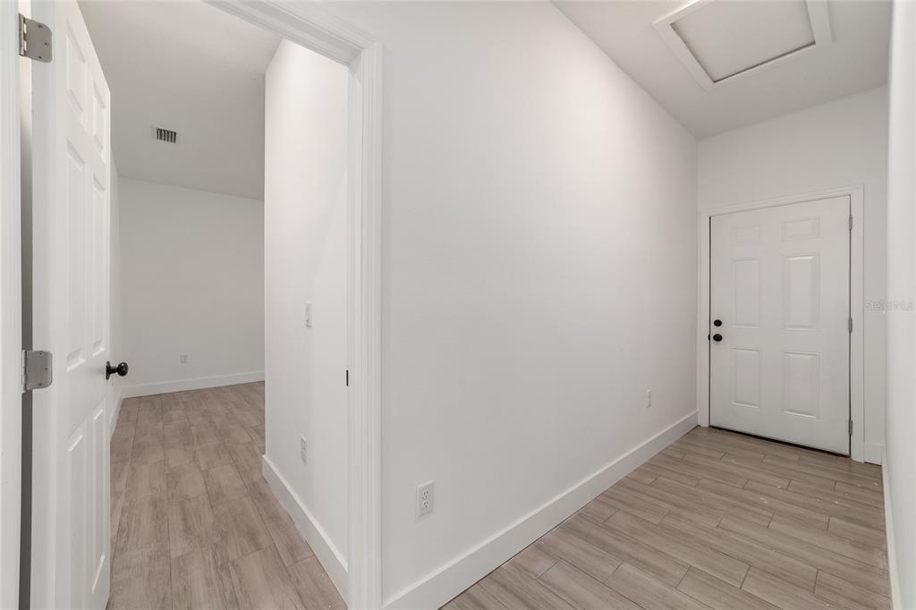 15431 Southwest 41st Street Road Ocala, FL 34481 - Photo 24 of 44 a view of a room with wooden floor