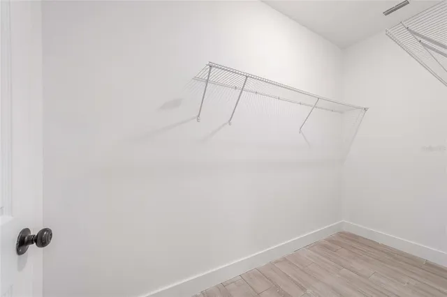 a view of a room with racks on the wall