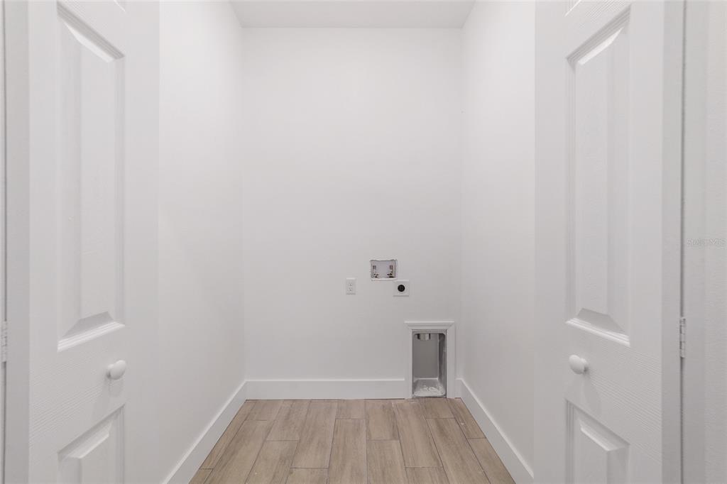 15431 Southwest 41st Street Road Ocala, FL 34481 - Photo 37 of 44 a view of a room with wooden floor