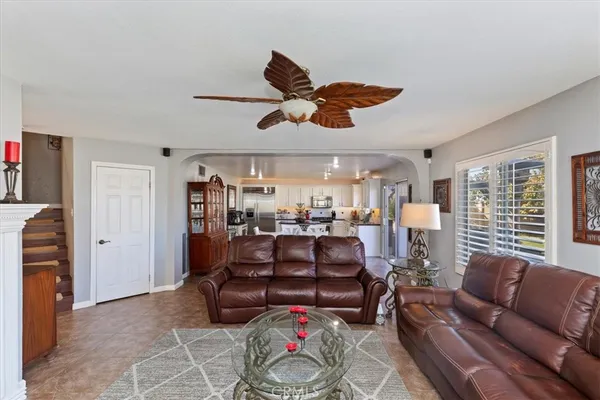 a kitchen with a table and chairs