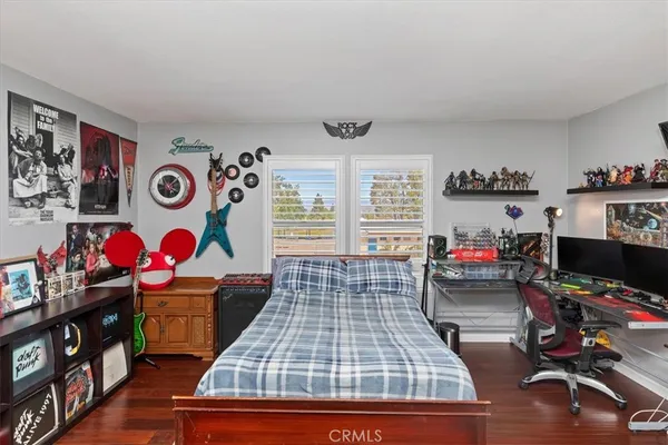 a bed room with a bed and a table in it