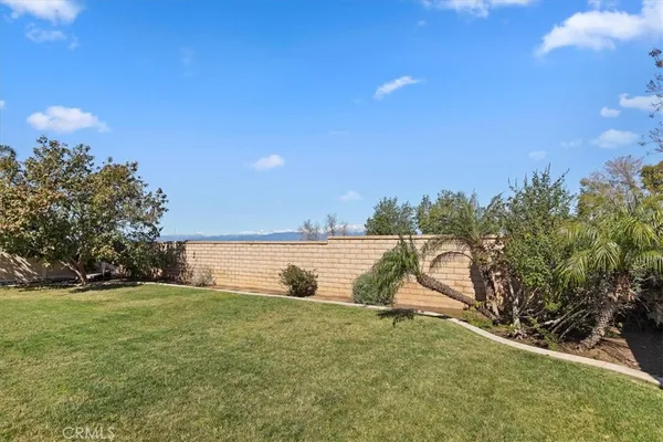 an aerial view of a house with a swimming pool yard and outdoor seating