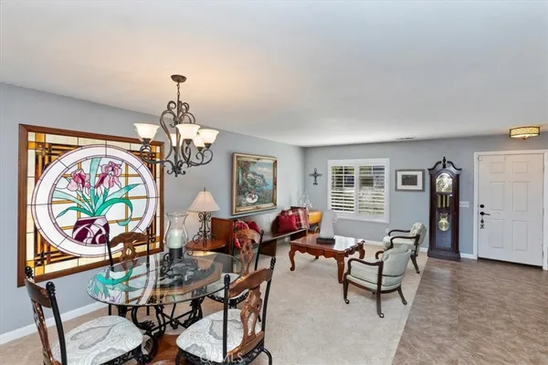 a view of a livingroom with furniture and a couch