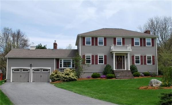 46 Edgewood Road Southborough, MA 01772 - Photo 1 of 1 a front view of a house with a garden and plants