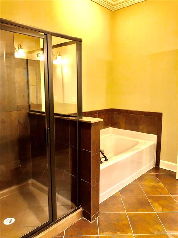 10575 Bent Tree View Duluth, GA 30097 - Photo 15 of 20 a bathroom with a bathtub and shower