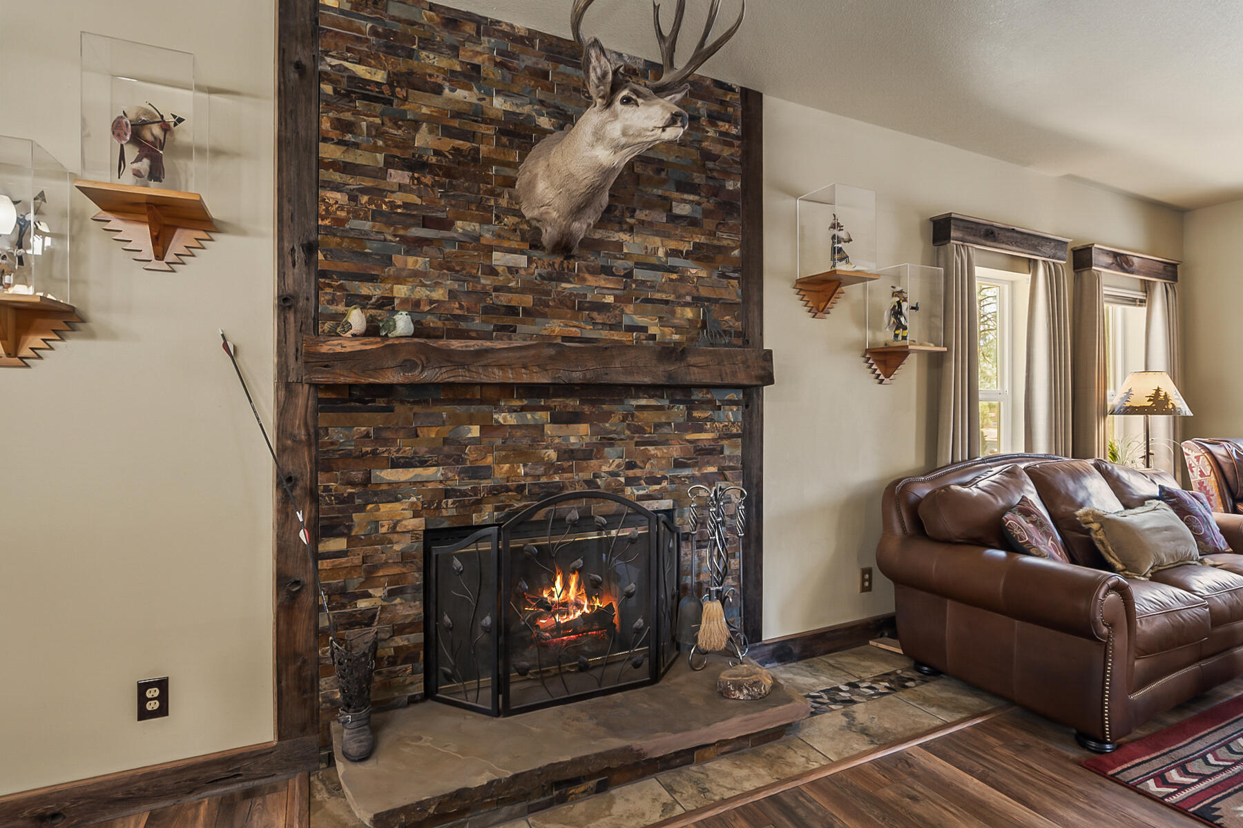 15730 Jackpine Road La Pine, OR 97739 - Photo 11 of 43 a living room with furniture and a fireplace