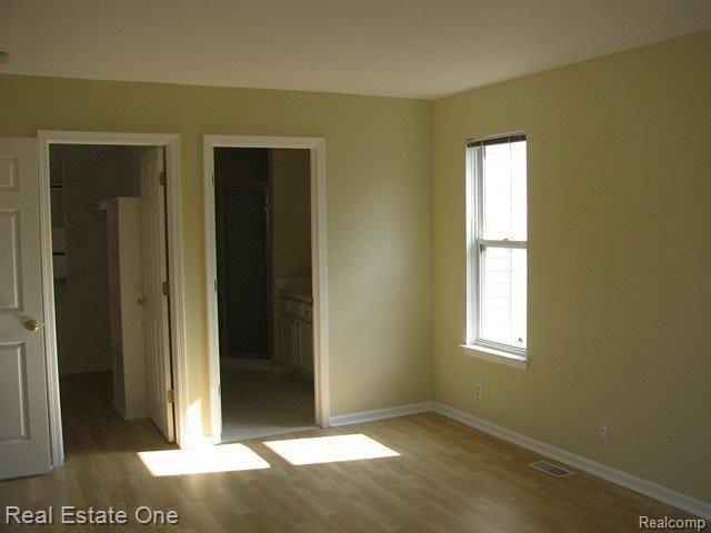 1 Devonshire Road Pleasant Ridge, MI 48069 - Photo 12 of 19 Bedroom 2 closet-bath.JPG