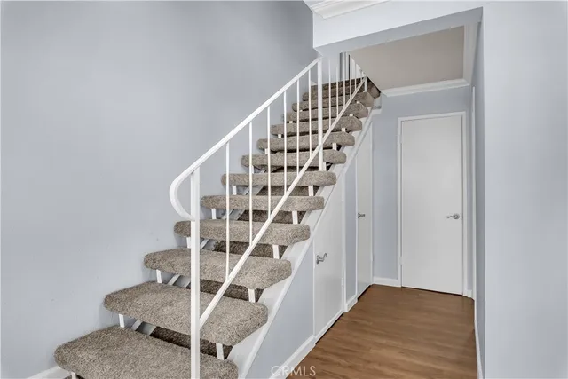 a view of entryway with wooden floor