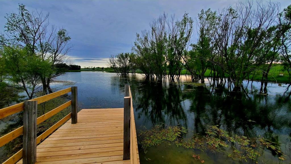 1943 Alsdorf Road Ennis, TX 75119 - Photo 36 of 38 a balcony with table and chairs
