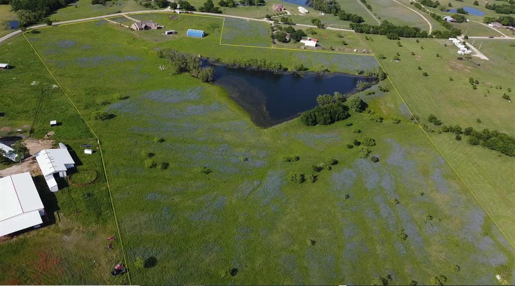 1943 Alsdorf Road Ennis, TX 75119 - Photo 38 of 38 an aerial view of a residential houses with outdoor space and trees