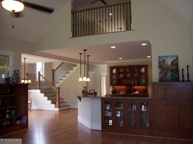 Kitchen. View of Kitchen & Breakfast rooms from the Greatroom.  There is a Loft over the Kitchen looking onto the Greatroom