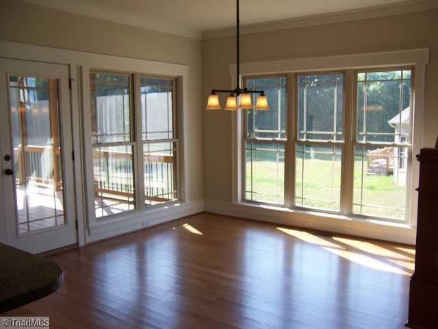 Breakfast. Lots of Glass, hardwood floors, opens onto Screened Porch