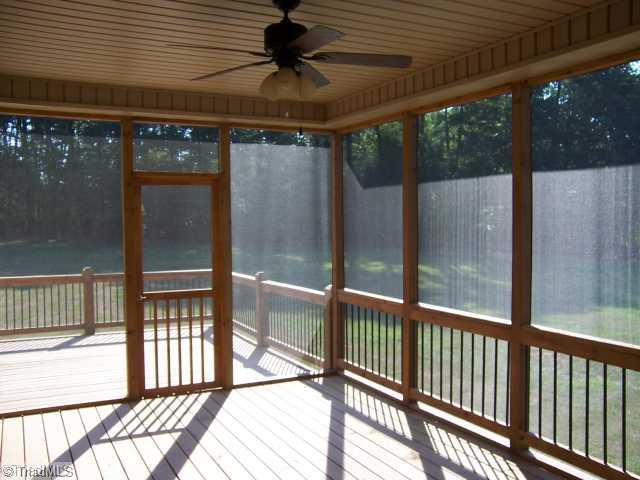 7776 Sutter Road Greensboro, NC 27455 - Photo 10 of 16 Other. Screened Porch has ceiling fan & opens onto Deck