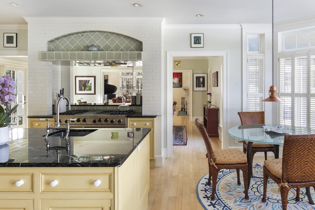 43 Oak Hill Road Harvard, MA 01451 - Photo 11 of 42 a kitchen with sink refrigerator dining table and chairs