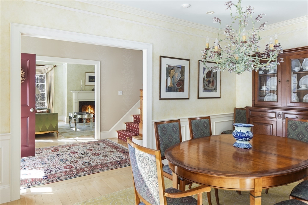 43 Oak Hill Road Harvard, MA 01451 - Photo 13 of 42 a dining room with chandelier and wooden floor